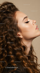 Profile of Woman with Curly Hair and Nose Ring