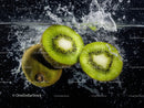 Fresh Sliced Kiwi Fruits in Water with Bubbles for Refreshing Snack