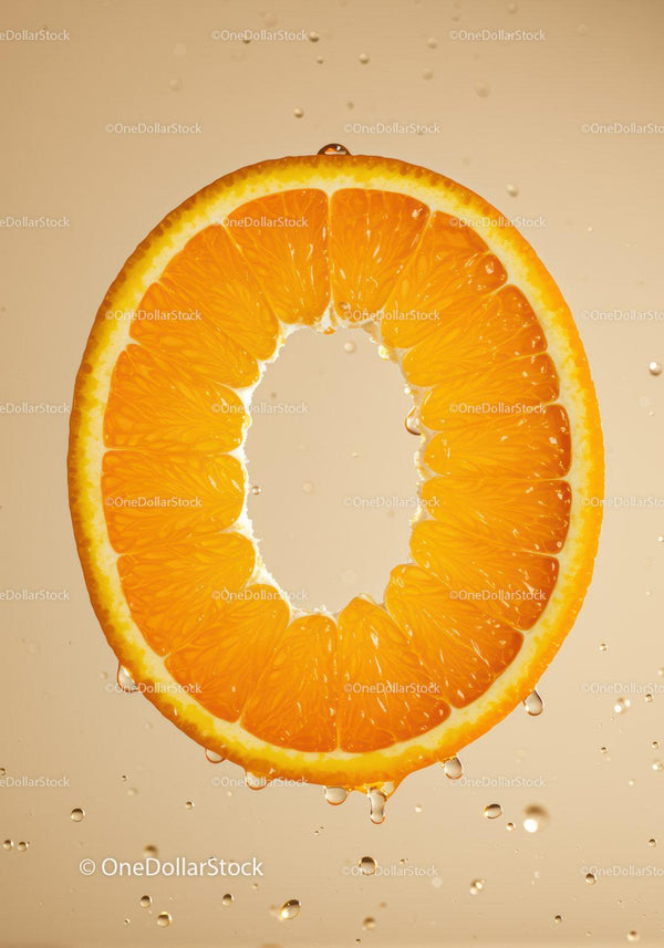 Juicy orange slice with water droplets closeup