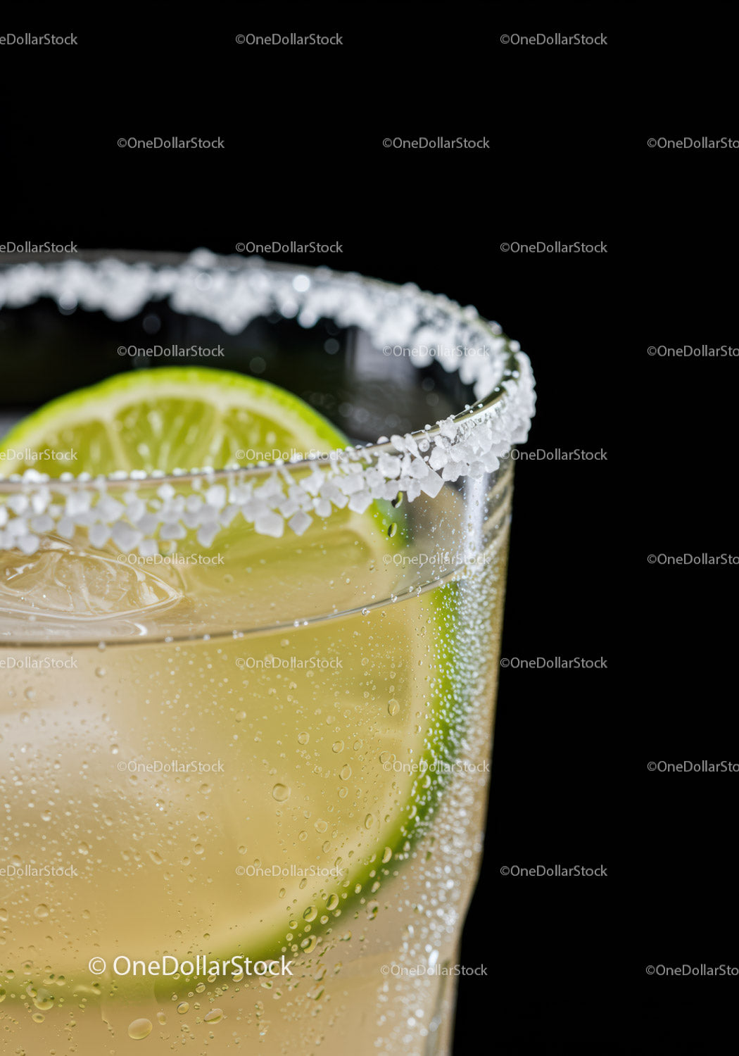 Refreshing Lime Cocktail with Salt Rim on Black Background