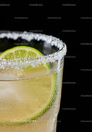 Refreshing Lime Cocktail with Salt Rim on Black Background