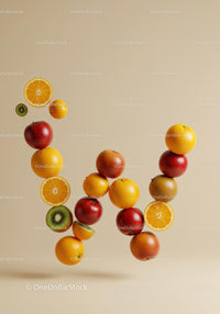 Fresh fruits creatively arranged in letter W shape