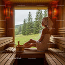 Serene Woman Relaxing in Wooden Sauna with Forest View