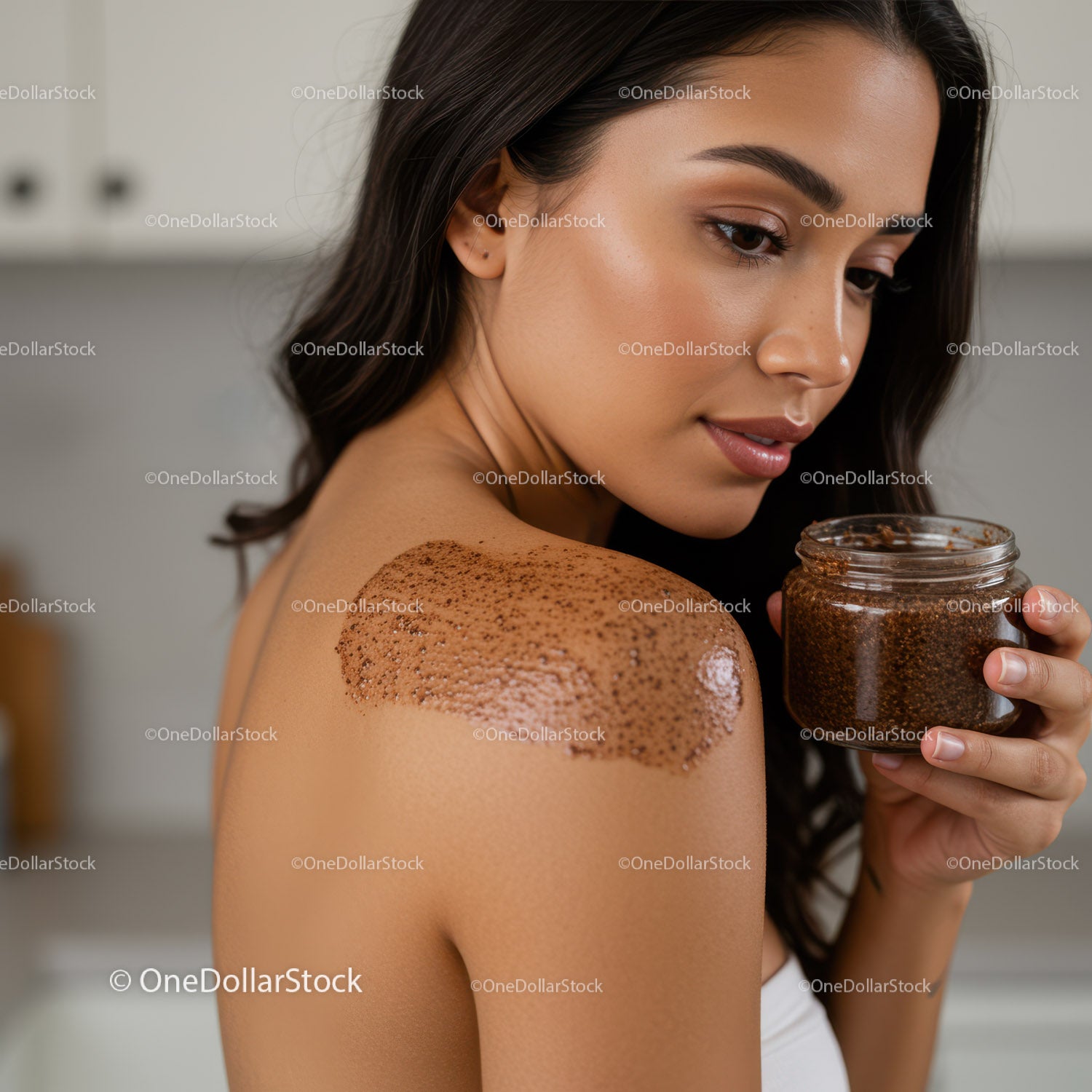 Young Woman Applying Coffee Scrub on Shoulder for Skin Rejuvenation