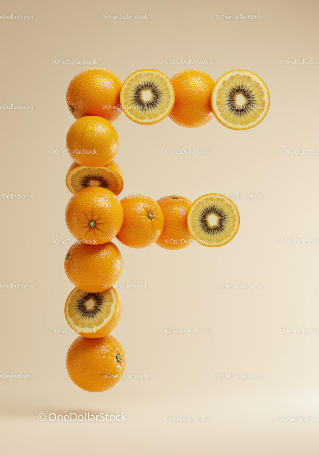 Creative letter F constructed from oranges and kiwifruit slices