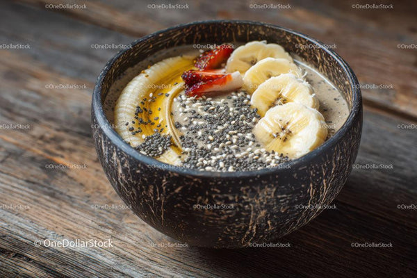 Fresh Smoothie Bowl with Banana and Strawberry Toppings