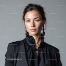 Elegant Woman with Black Jewelry and Stylish Outfit