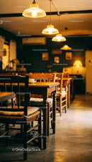 Cozy vintage cafe interior with warm lighting ambiance