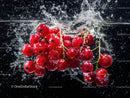 Red Currants Splashing Into Water in Vibrant Motion