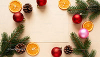 Festive Christmas layout with ornaments and pine branches