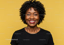 Vibrant Portrait of African American Woman with Curly Hair on Yellow Background
