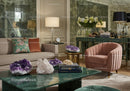 Elegant living room with velvet chair and crystal decor