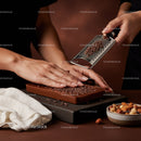 Chocolate Grating and Melting for Dessert Preparation