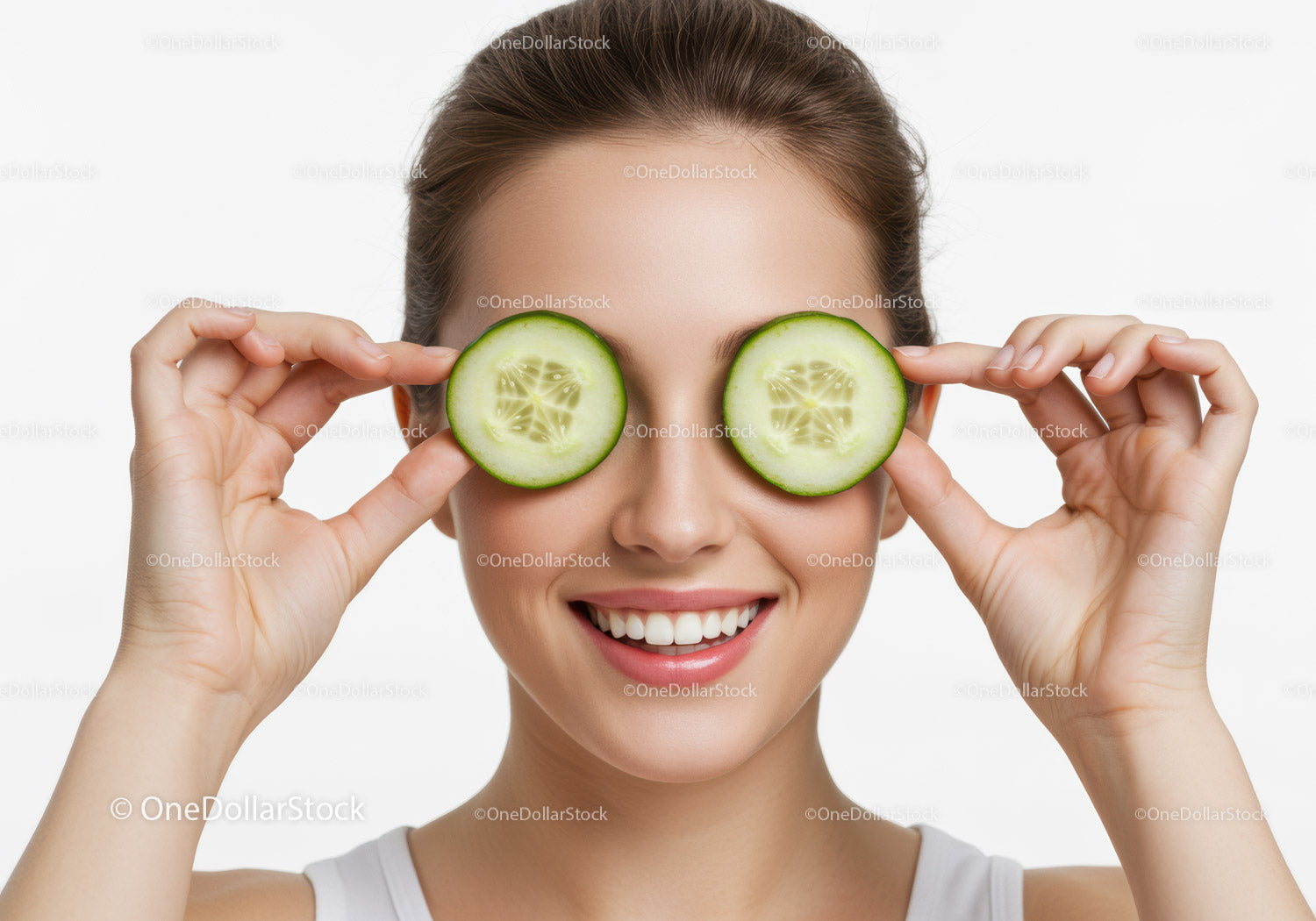 Smiling Woman with Fresh Cucumber Slices Over Eyes