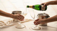 Elegant celebration with champagne glasses clinking in luxurious setting