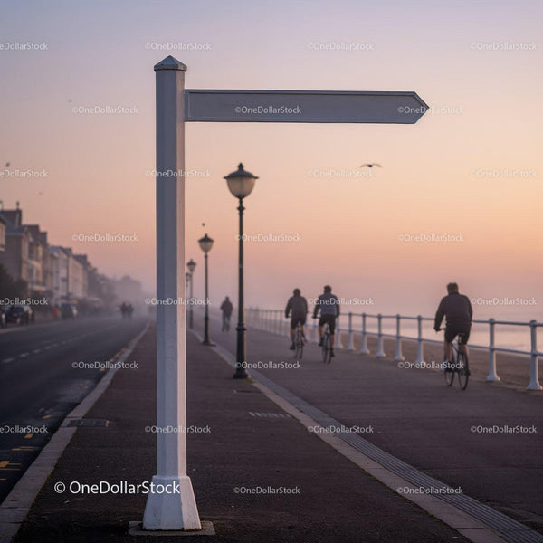 Cyclists riding on coastal promenade at sunrise JPG Mockup Image