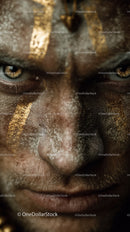 Close-up of An African Tribal Face with Gold Metallic Body Art