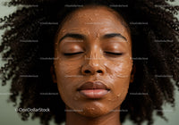 Young woman enjoying a relaxing facial mask for smooth glowing skin