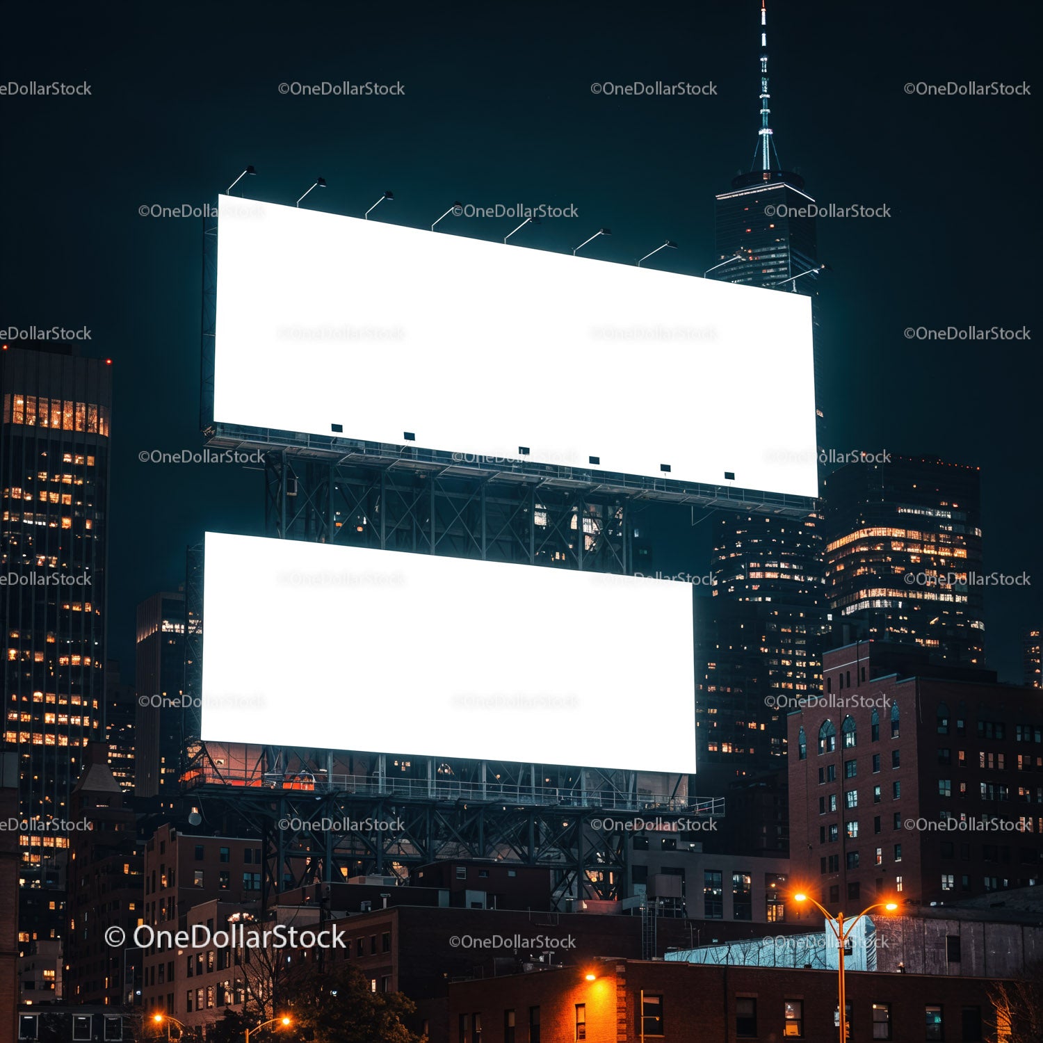 Blank illuminated billboards over city buildings at night