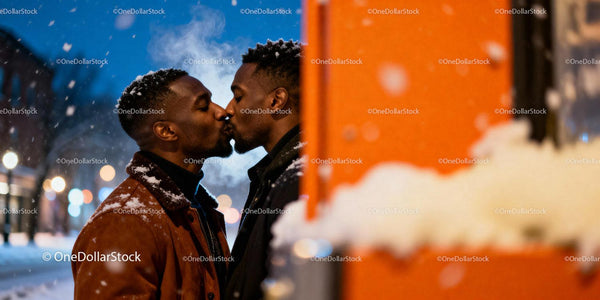 Couple Sharing Intimate Kiss in Winter Snowfall