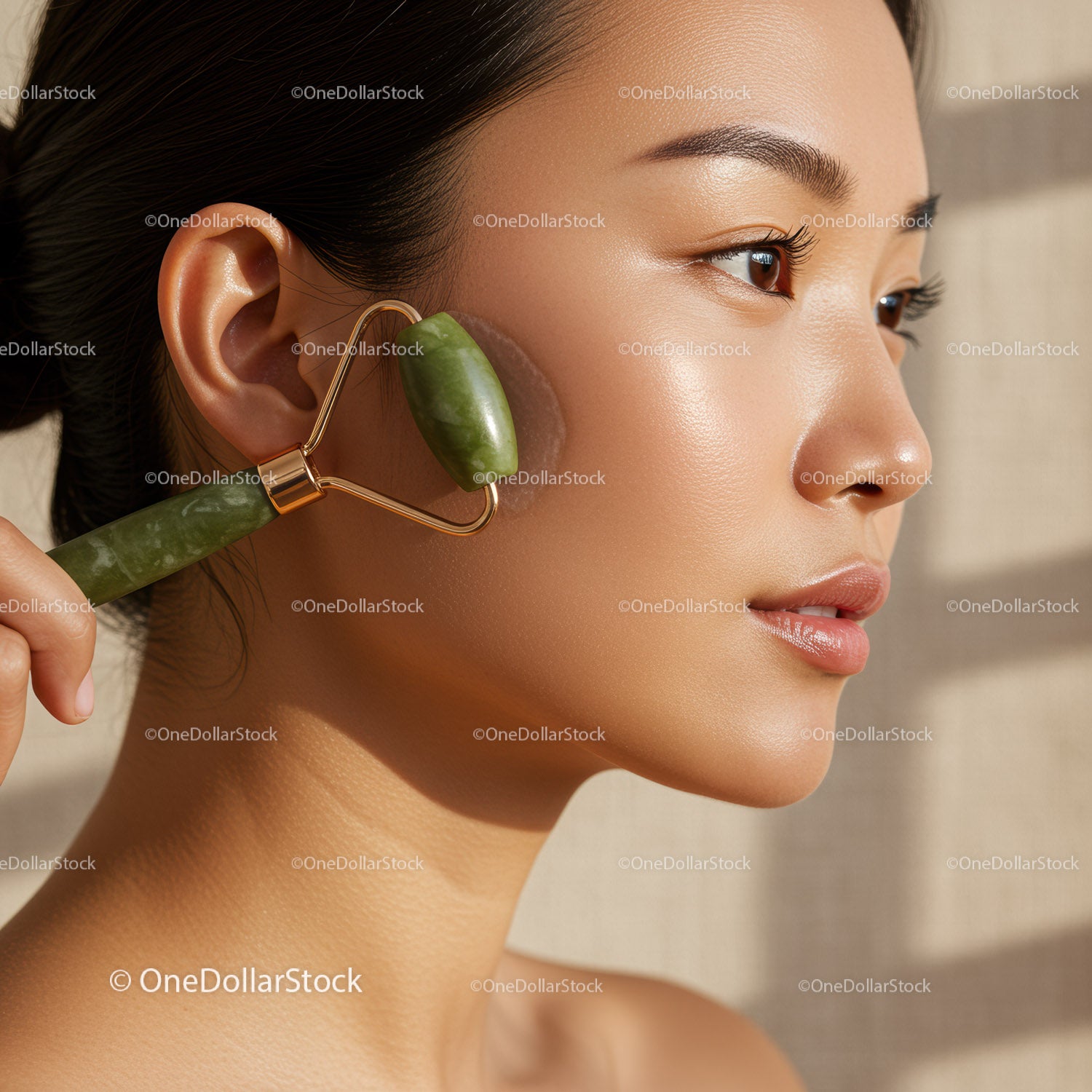 Woman Using Jade Roller for Facial Massage and Skin Rejuvenation