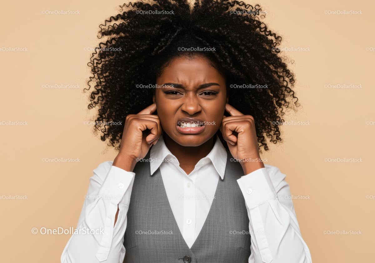 Frustrated Woman Covering Ears with Annoyed Expression