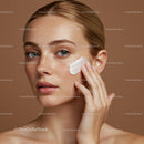 Close-up of Woman Applying Cream to Face with Flawless Skin