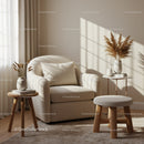 Cozy beige armchair with natural decor in sunlit room