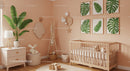 Modern Baby Nursery with Wooden Crib and Botanical Wall Art