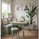 Stylish Cozy Dining Area with Green Plants and Wooden Furniture