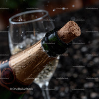 Champagne Bottle with Cork Popping and Sparkling Bubbles