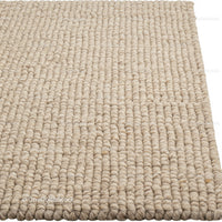Beige Woven Rug with Textured Pattern for Modern Interior Decoration