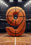 Number nine shaped as textured basketball on court