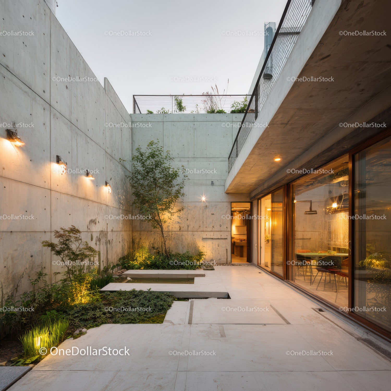 Modern Concrete Patio with Greenery and Outdoor Lighting