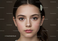 Elegant Portrait of a Young Girl with Brown Eyes and Pearl Hair Clip