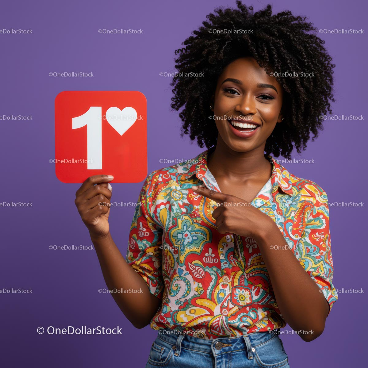 Smiling Woman Holding Heart Sign with Colorful Shirt Against Purple Background