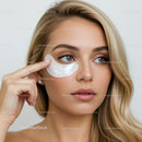 Beautiful Woman Applying Under-Eye Gel Mask for Skin Rejuvenation