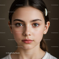 Elegant Young Woman with Hazel Eyes and Pearl Hair Clip