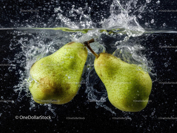 Fresh Green Pears Splashing into Water with Dynamic Motion