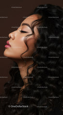 Close up profile of calm woman with curly hair