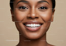 Closeup of smiling woman with flawless skin and teeth