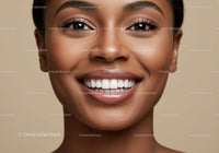 Closeup of smiling woman with flawless skin and teeth