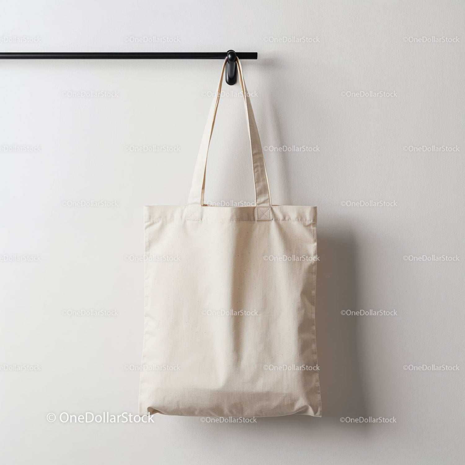 Minimalist Beige Cotton Tote Bag Hanging on Wall Hook