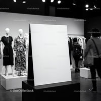 Blank Poster on Stand in Modern Fashion Boutique