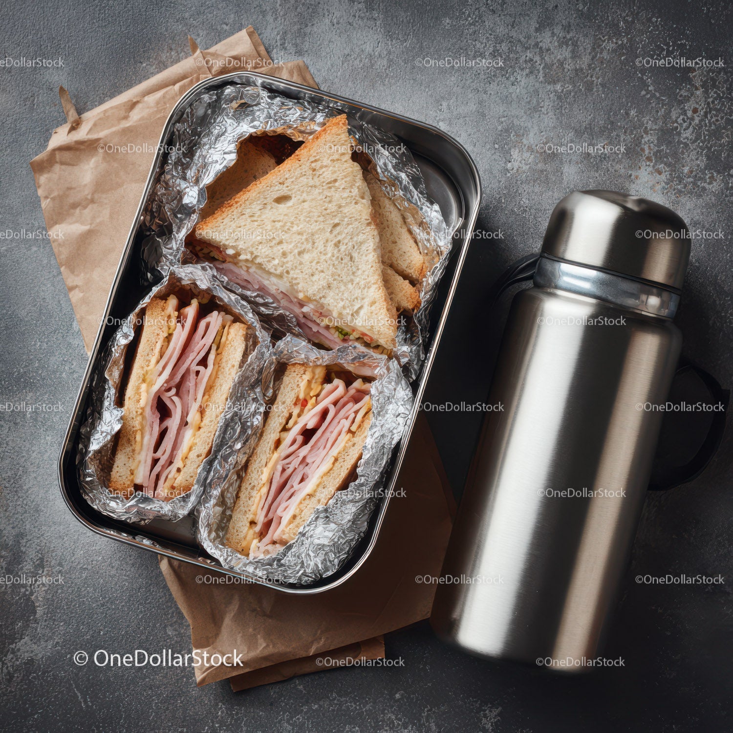 Ham and Cheese Sandwiches with Thermos on a Rustic Table