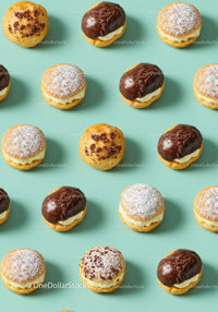 Assorted cream-filled profiteroles on pastel background