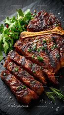 Grilled Beef Ribs with Fresh Green Herbs on Plate