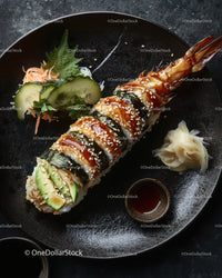 Fresh Sushi Roll with Shrimp and Avocado on Black Plate