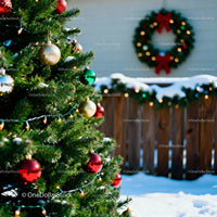 Festive Christmas Tree and Wreath in Snowy Backyard
