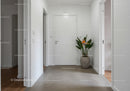 Clean Modern Hallway with Indoor Plant and Minimalist Decor